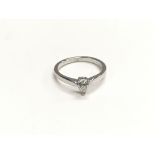 An 18ct white gold pear shaped diamond ring, appro