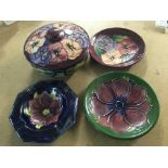 A Moorcroft powder bowl decorated with pansies, to