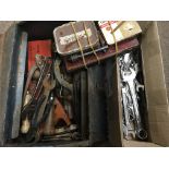 Two metal cases containing various old tools, a co