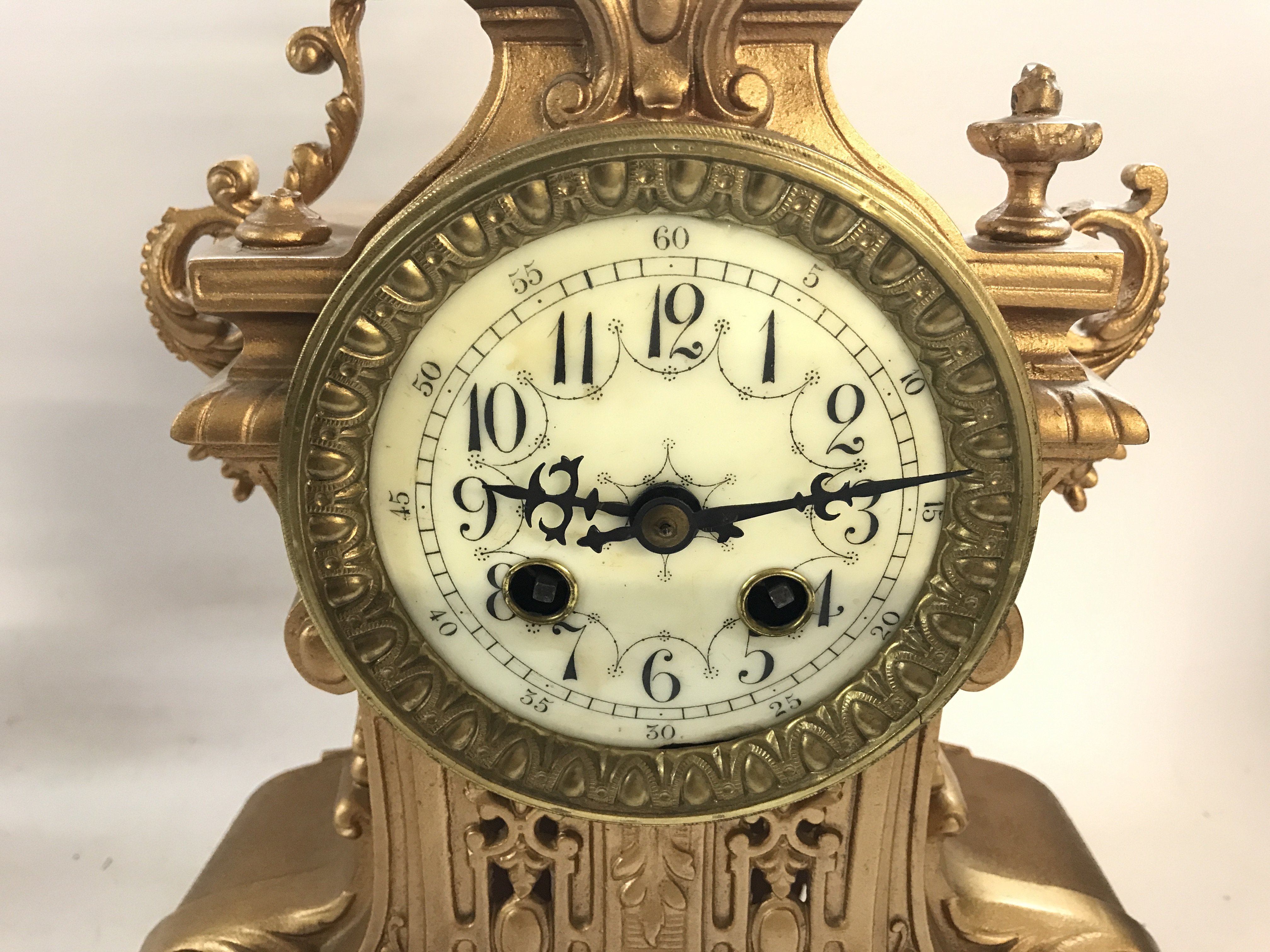 A gilt metal French clock. - Image 2 of 3