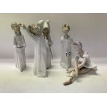 5 Lladro porcelain figurines.