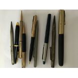 A collection of pens various
