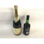 A magnum of Harrods champagne and a bottle of Bank