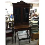 An Edwardian inlaid mahogany bureau bookcase havin