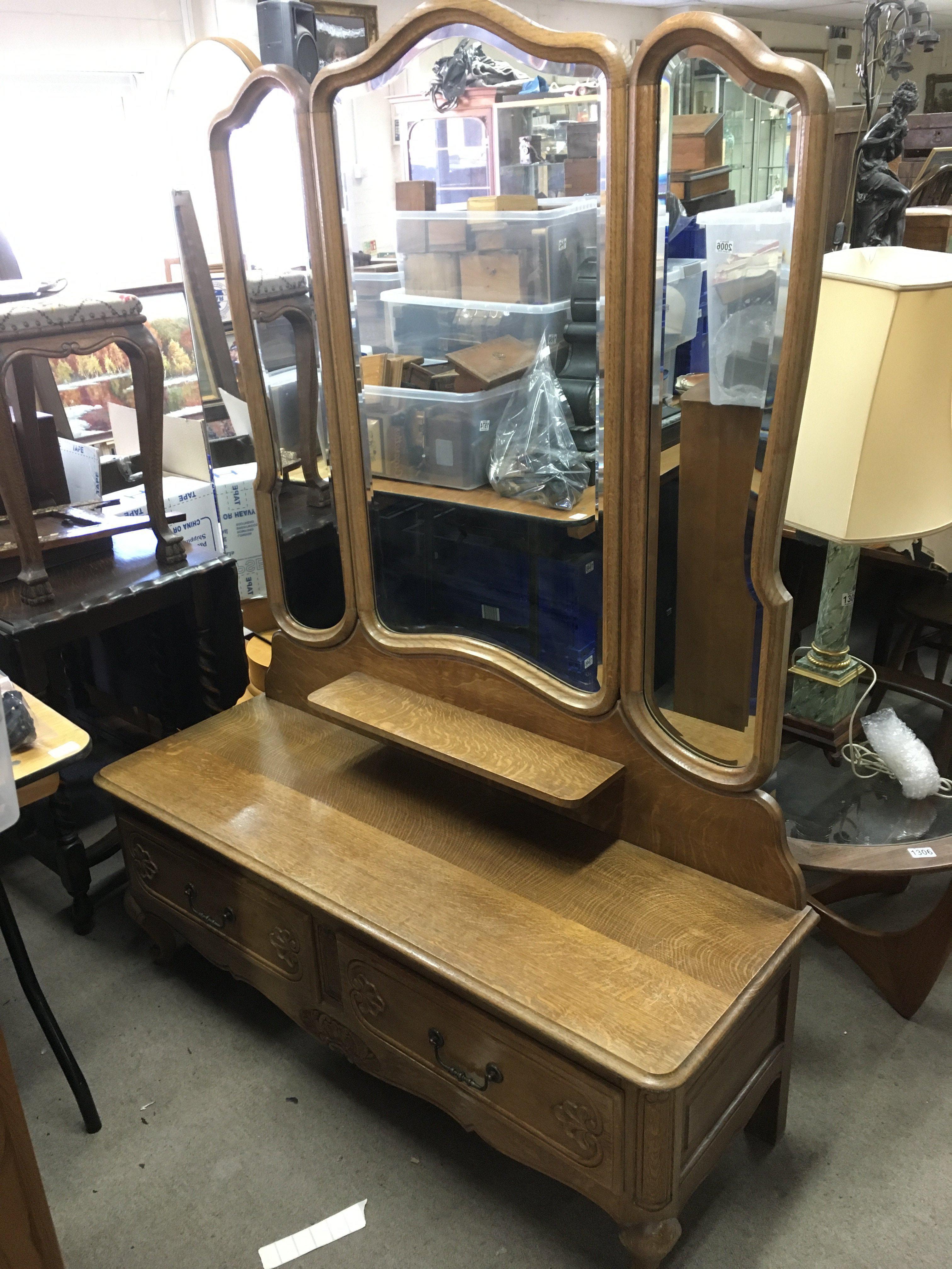 A Continental dressing table with bevelled edge mi