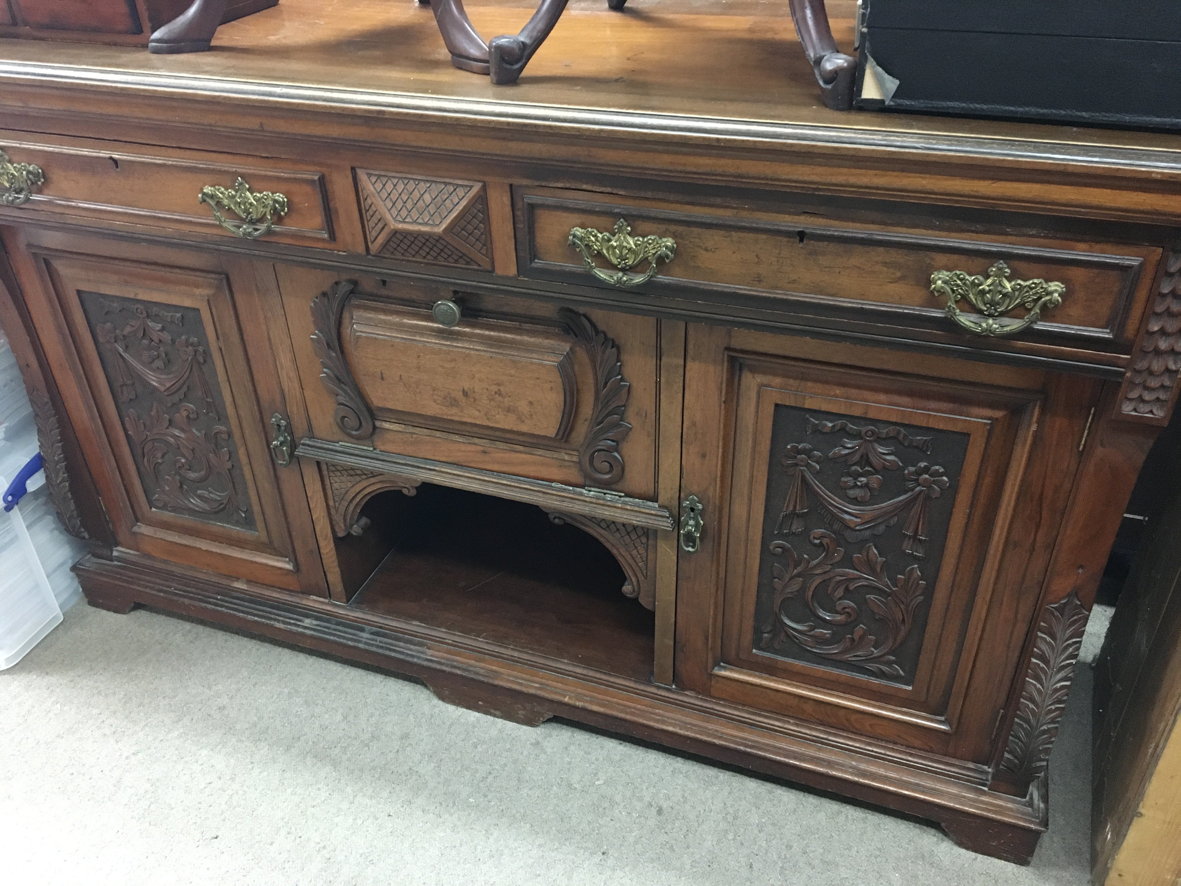 A Edwardian mahogany sideboard fitted with two dra