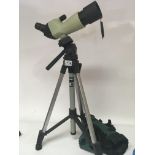 A Nikon Spotting Monocular Scope with adjustable stand and canvas case.