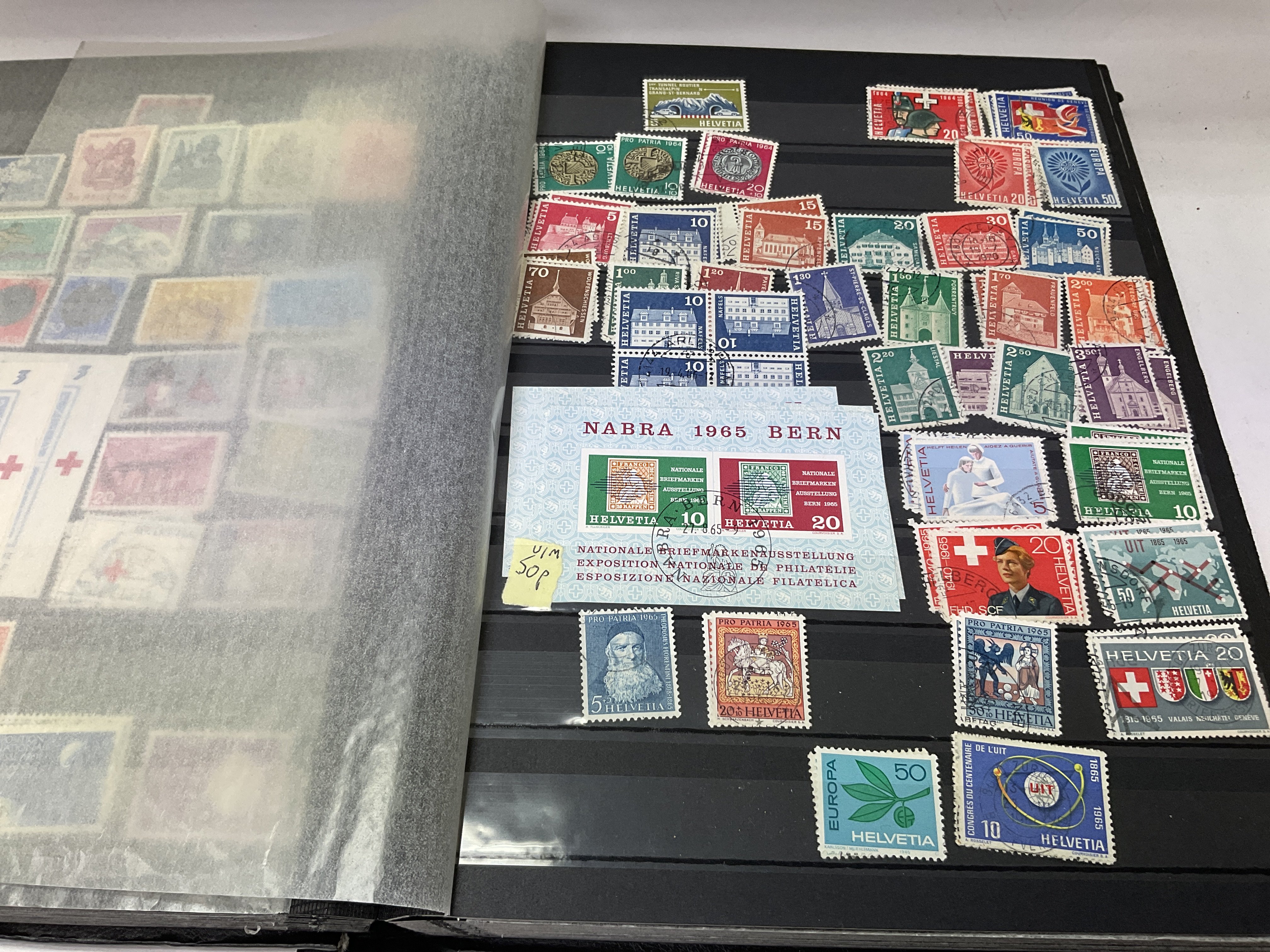 A large stock book includes Switzerland and Italy stamps. - Image 3 of 3