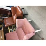 Two retro open armchairs one in pink dralon and brown simulated leather.