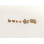 A 9ct gold studs and cuff link set. Weight 9.3g to
