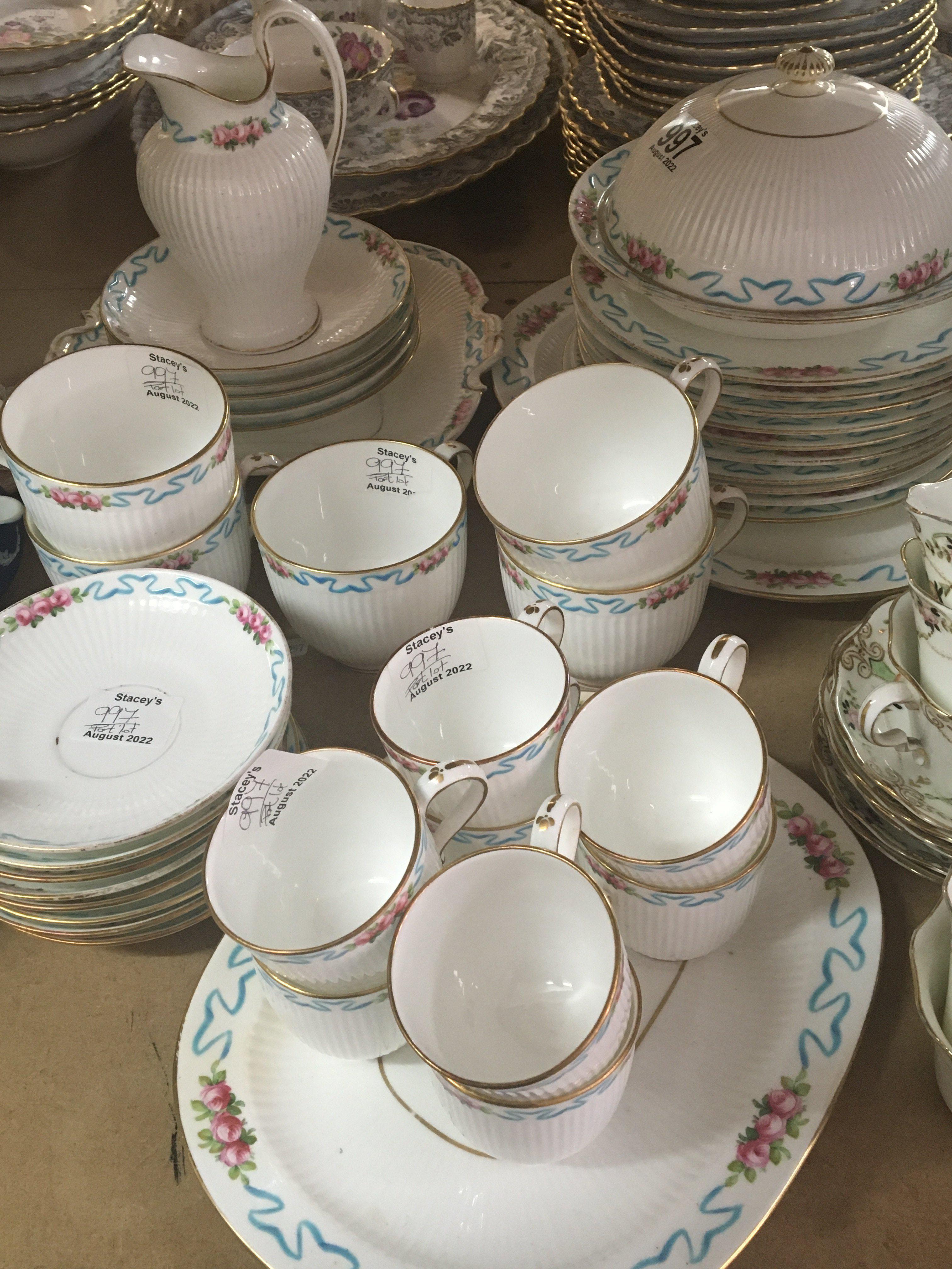 A decorative porcelain tea set decorated with flow