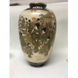 A Japanese satsuma vase decorated with figures wit