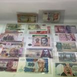 A selection of good world banknotes including South America, African states etc.