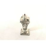 A Hallmarked silver table lighter approximate 10cm