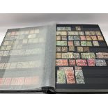 A large stock book includes Switzerland and Italy stamps.