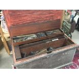 A quality carpenters tool chest of stained pine and mahogany with detachable mahogany compartments