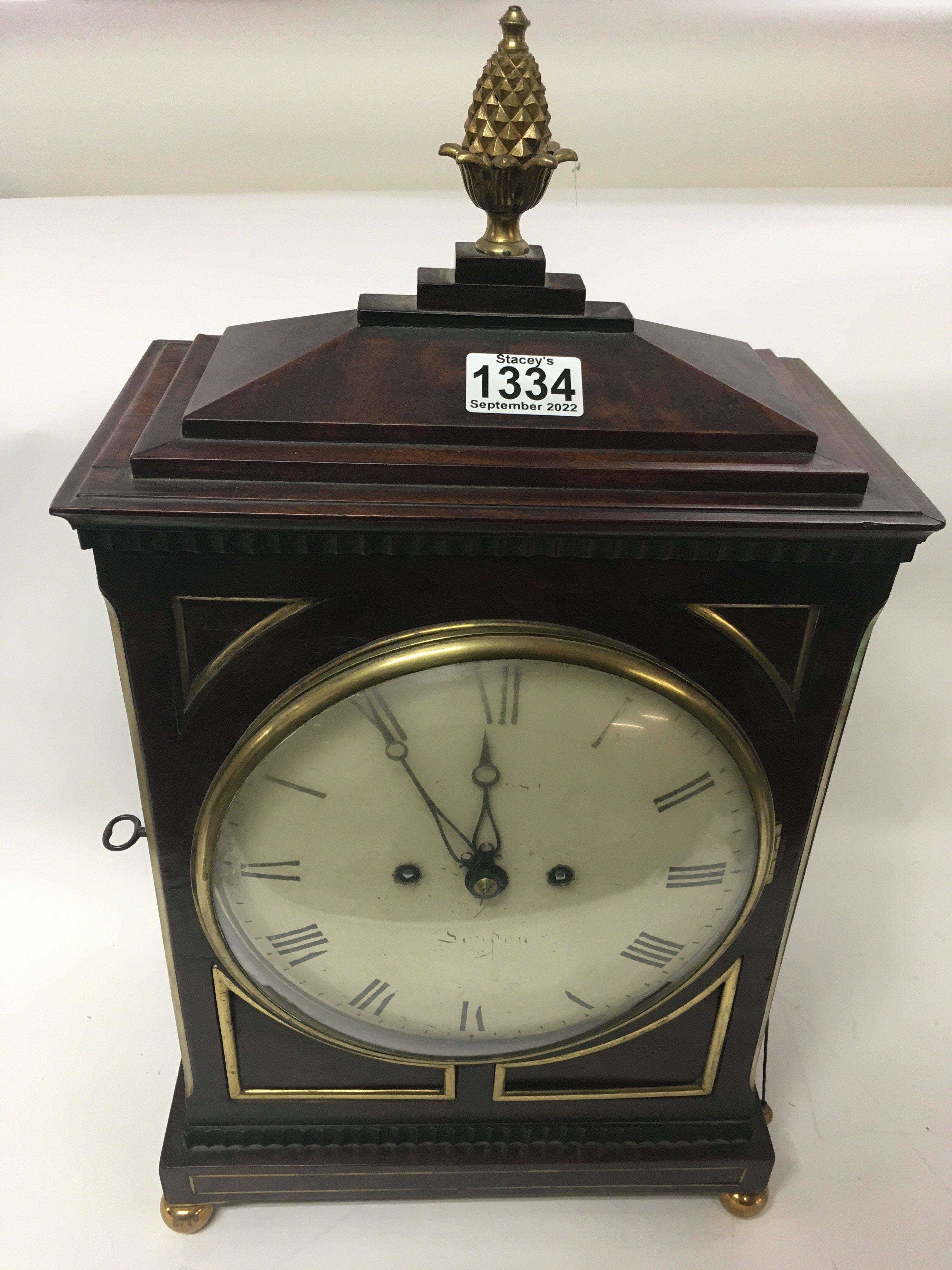 A Georgian mahogany bracket clock, circular dial w