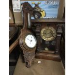 A mahogany cased clock with an eight day movement together with an oak cased barometer (2).