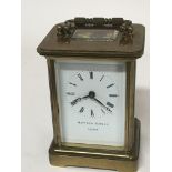 A Mathew Norman London brass cased carriage clock.