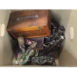 A box containing ornaments collectors plates and o