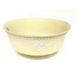 A yellow Wedgwood sprig decorated bowl 20cm wide.
