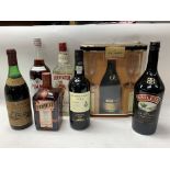 A selection of alcohol including Remy Matin, 1976 Quinta Do Convento etc..