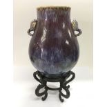 A Chinese sang de boeuf baluster vase with faux el