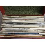 Two record cases and a bag if LPs and 7inch singles by various artists from the 1960s onwards.