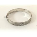 A hallmarked silver bangle.