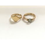 A pair of 18ct gold rings. Total weight 8.8g