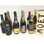 A collection of Ports wines Champagne and a bottle of Johnny Walker old Scotch whisky.