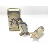 1950's tinplate walking penguin with box and a sha