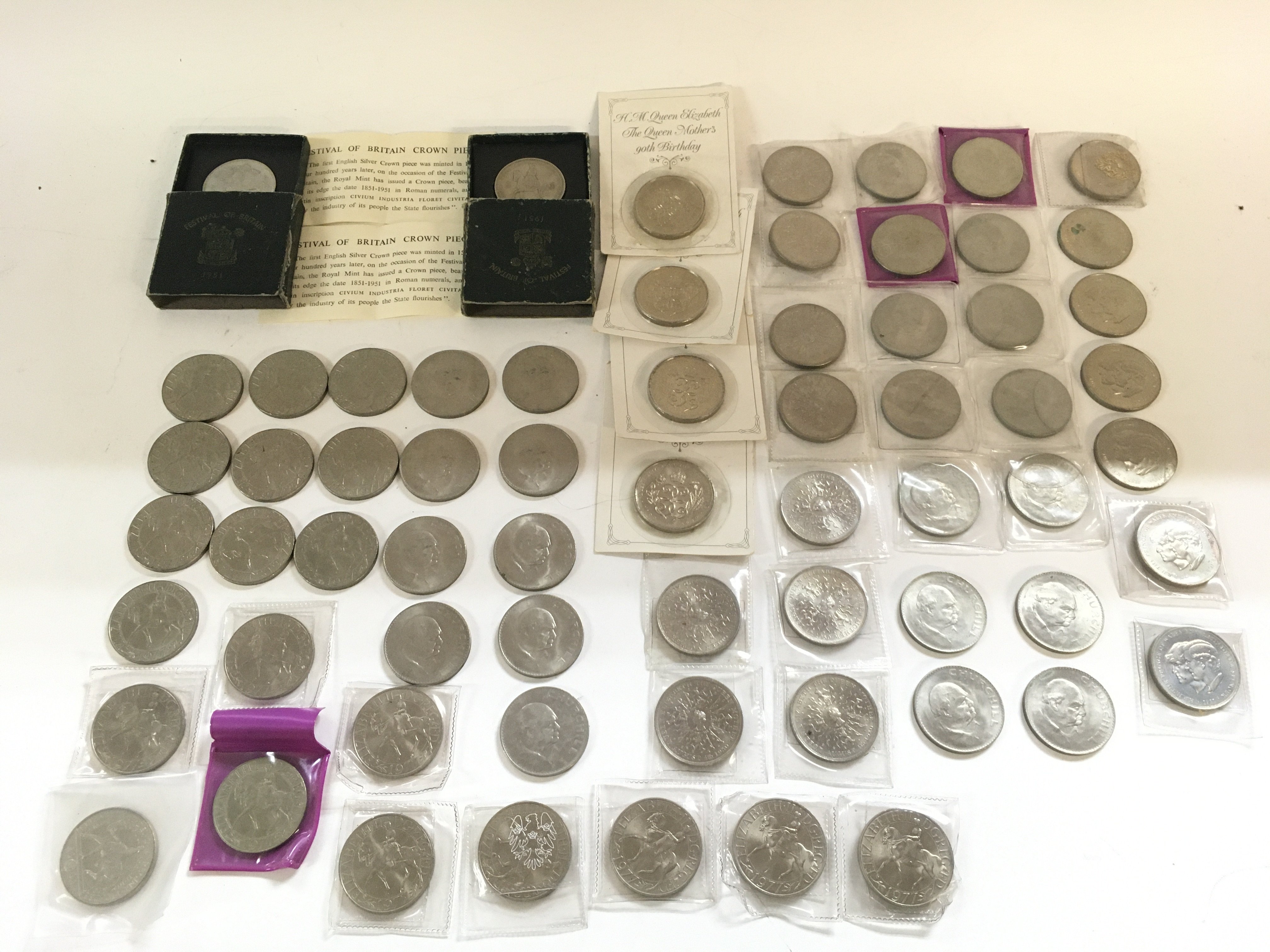 A large collection of various coins including 4 x