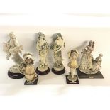 A collection of various resin figurines.