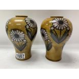 A pair of Royal Doulton stoneware pottery vases by