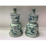 2 oriental blue and white Temple bell shaped candl