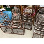 Three reproduction matching bird cages.