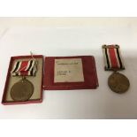 A George V and George VI police long service medal