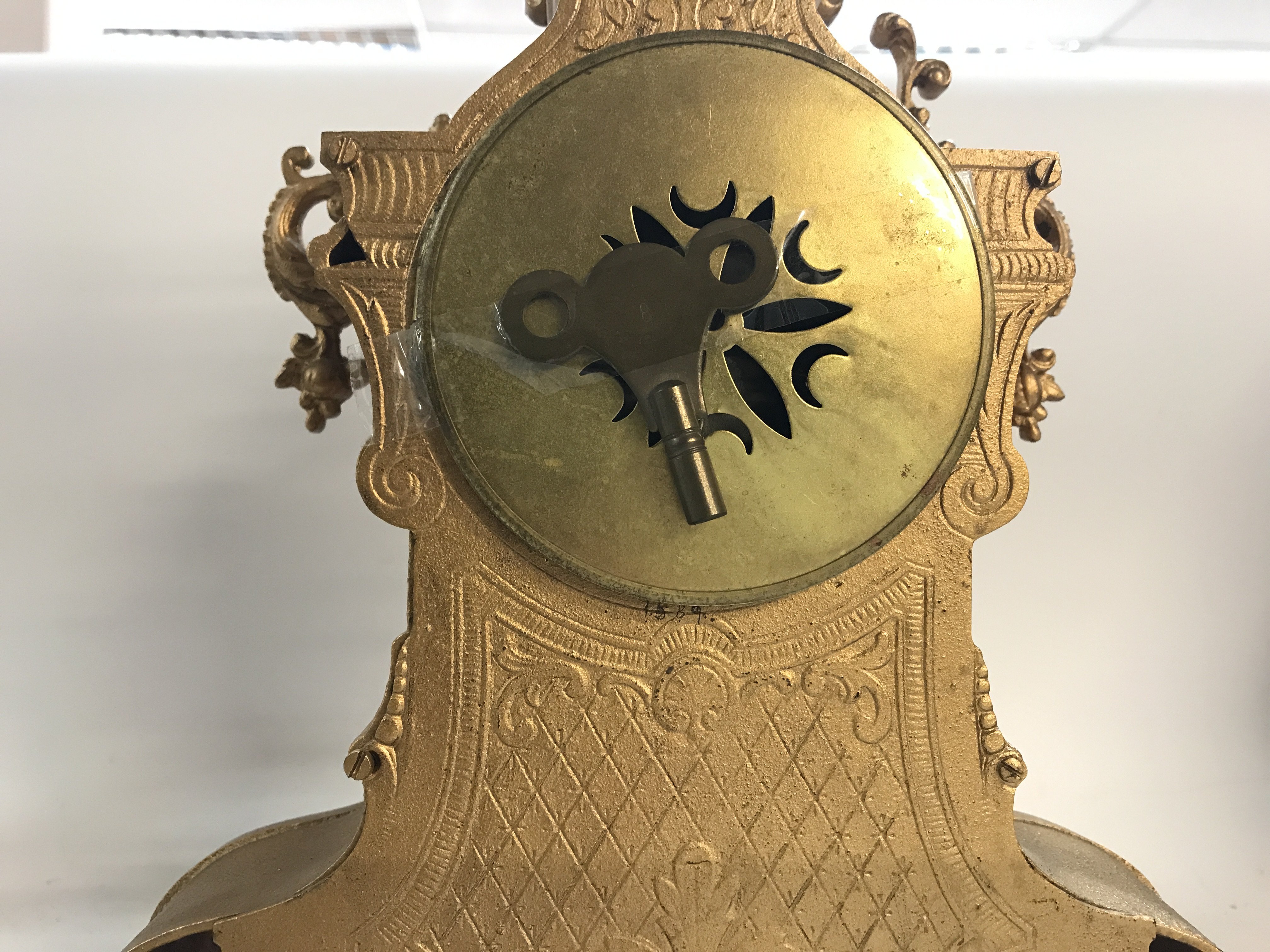 A gilt metal French clock. - Image 3 of 3