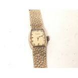 A ladies 9carat gold watch maker Zodiac. With attached 9carat gold bracelet. Weight 23g