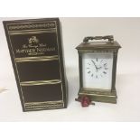 A large Brass carriage clock by Mathew Norman Swit