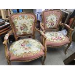 A pair of French style open arm chairs with floral