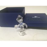 A Swarovski Crystal Disney figure Pinocchio boxed