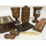 A collection of treen and sewing implements with i