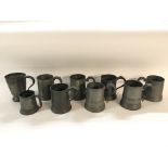 Collection of 19th century and earlier pewter mugs