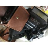 Two bags of various vintage camera lenses, cased c