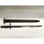 An American 1917 Remington bayonet with metal capp