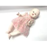 Vintage 15' long dressed doll with sleeping eyes,