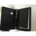 A Genuine Mount Blanc leather note pad with pen bo