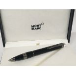 A genuine Mont Blanc pen in a fitted box.
